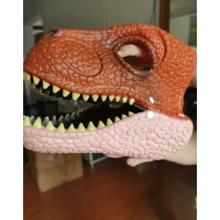 Dinosaurmaske med åbnende kæbe, øjen- og næseåbninger og sikker